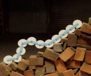 Robot Caterpillar Climbs a Pile of Wood