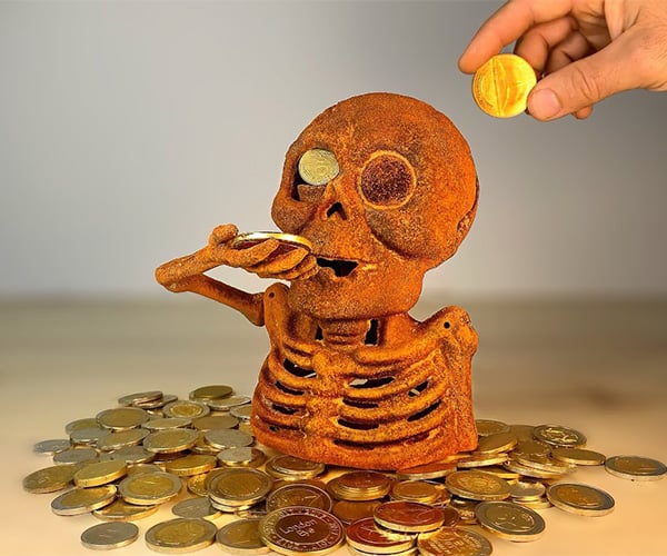 Restoring a Rusty Skeleton Coin Bank