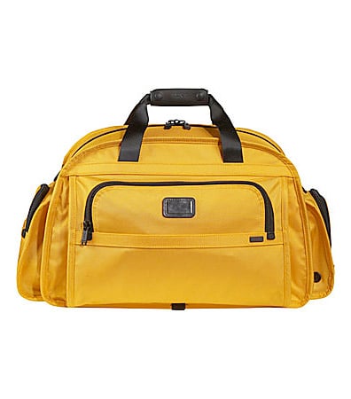 tumi yellow luggage