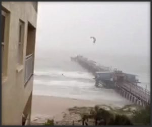 Kite Surfer Jumps Pier