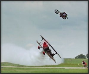 Motorcycle Jumps Airplane