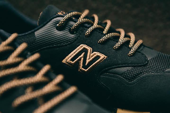 black and bronze new balance