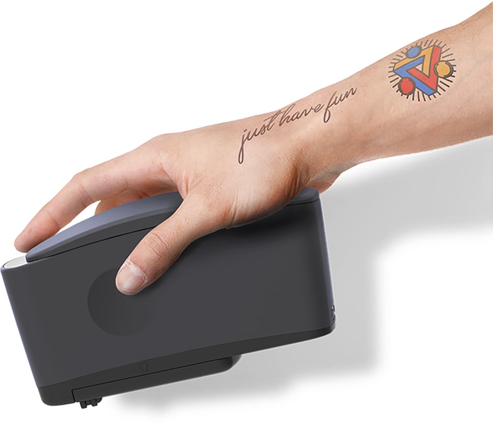 This handheld printer lets you put your best art on your arm temporarily -  Yanko Design