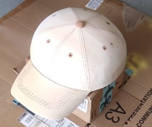 Carving a Wooden Baseball Cap