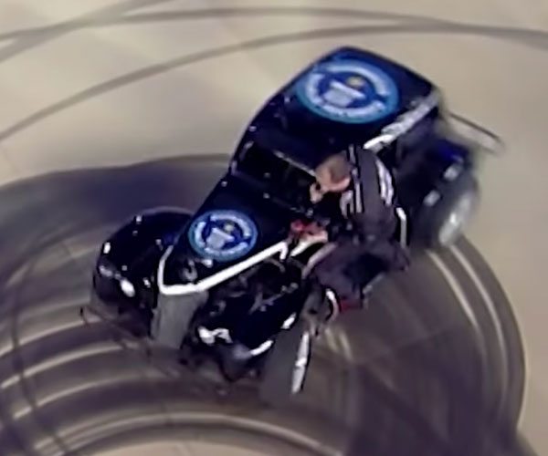 Changing a Tire on a Spinning Car