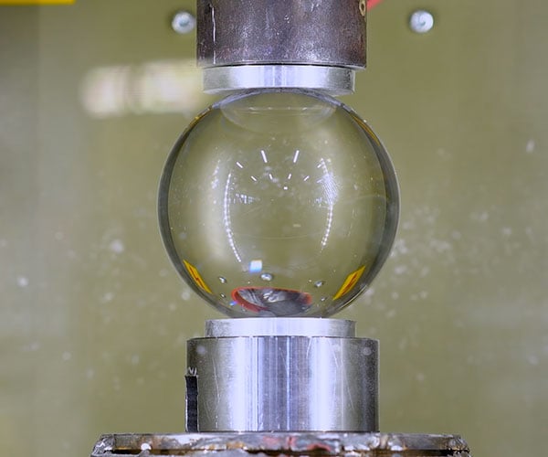 Hydraulic Press vs. Glass Sphere