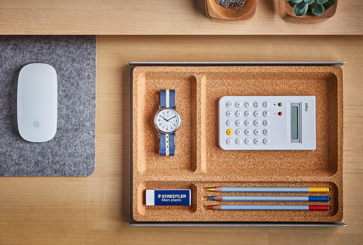 This desk tray by Grovemade uses cork and aluminum