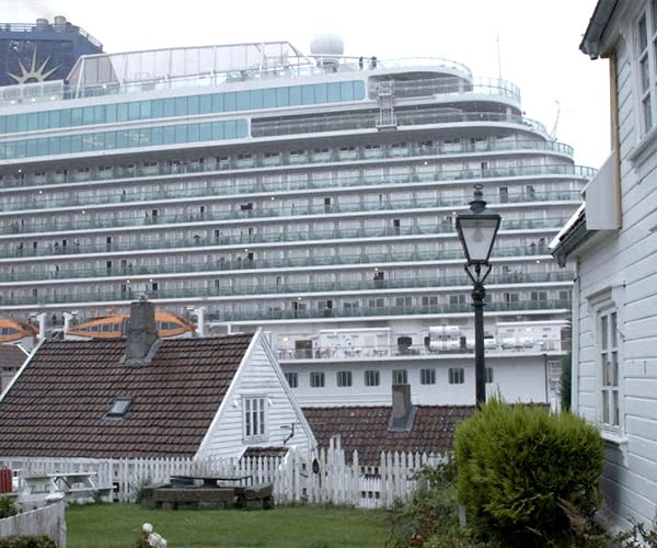 Giant Cruise Ship vs. Homes
