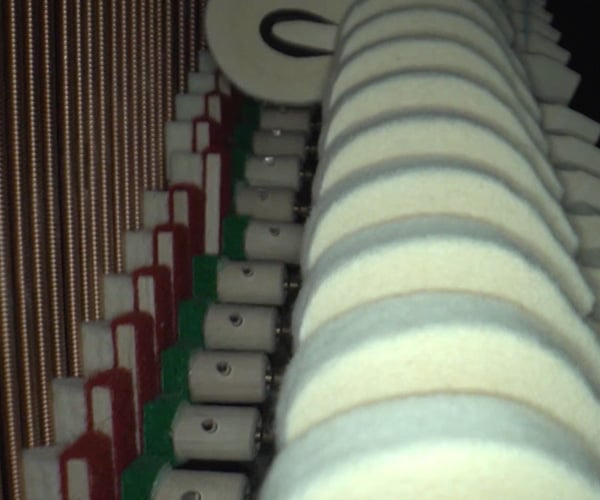 Macro Footage Inside a Piano