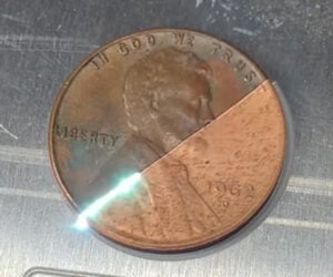 Cleaning Coins with a Laser