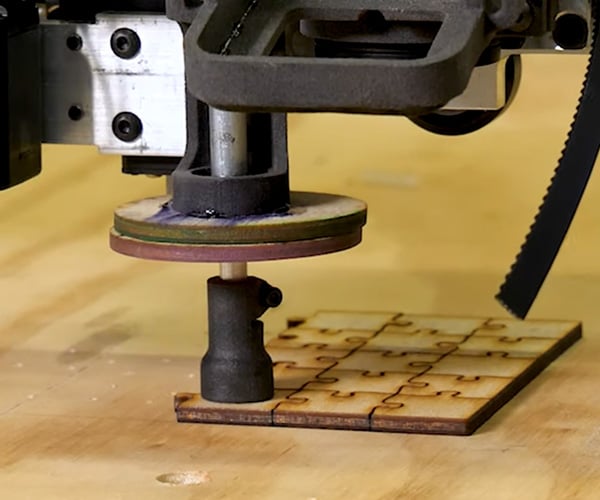 A Robot That Can Solve Jigsaw Puzzles