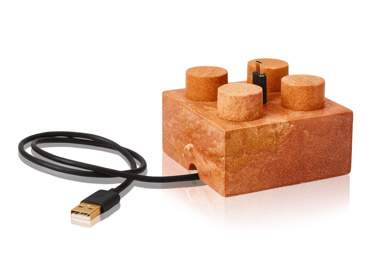 This Stone Phone Stand Looks Like a Giant LEGO Block