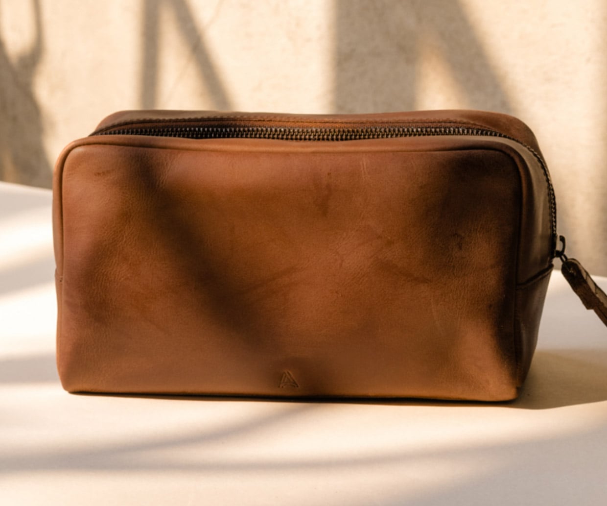 ABLE’s Leather Avery Dopp Kit Combines Style, Craft, and Social Impact