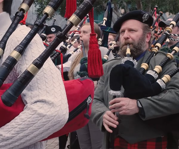 Bagpipers Wail on AC/DC for World Record