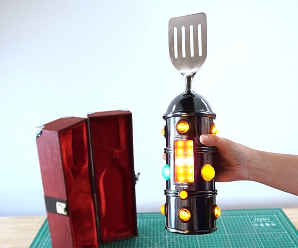 This Porcelain Robot Wants You to Bite its Shiny Golden Ass
